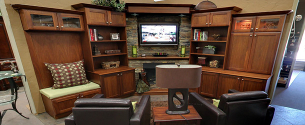 A large wooden entertainment center on sale in our showroom.